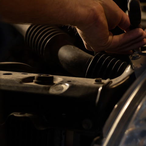 mechanic fixing car roadside tools